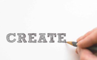 Hand writing the word create