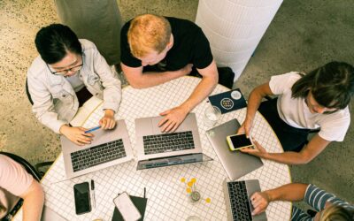 photo of people using laptop