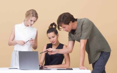 People collaborating over a laptop