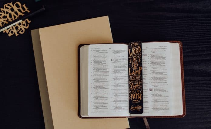 book with a black and gold bookmark