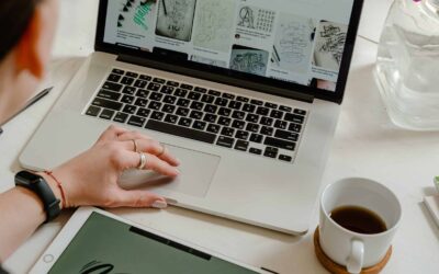 person using macbook on table become a creative