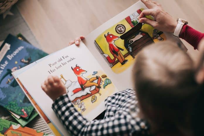 Child looking at a children's book