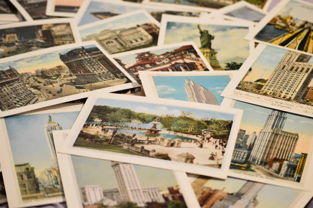 Postcards spread out on a flat surface